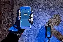 Blue Smart IP65 Charger motorcycle hand with iPhone.webp